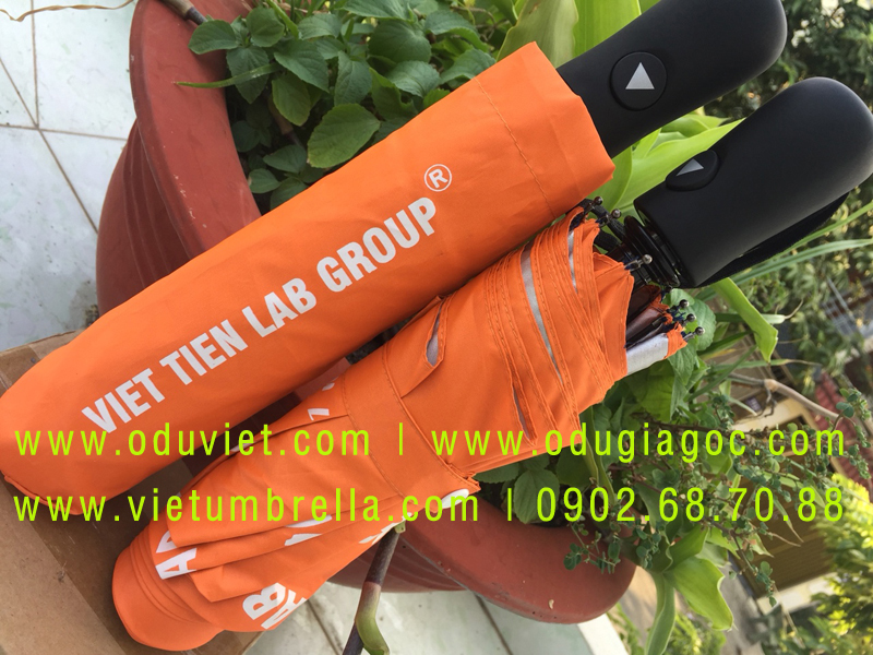 xưởng sản xuất ô dù cầm tay in logo quảng cáo
